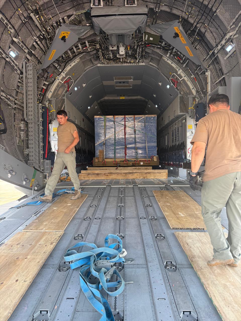 Cargo loading operation inside a transport aircraft